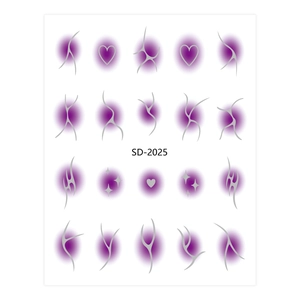 Macro view of Y2K style nail stickers with purple gradient dots and silver tribal patterns