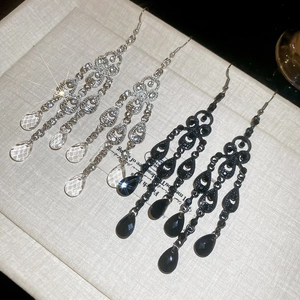 Detailed comparison of luxury silver and black teardrop hollow chandelier earrings