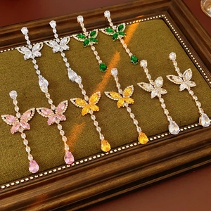 Detailed display of five pairs of zircon butterfly tassel earrings in assorted colors