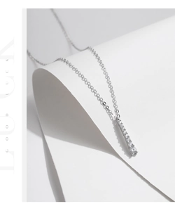 Detailed view of S925 sterling silver Y-shaped tassel necklace with sparkling moissanite stones