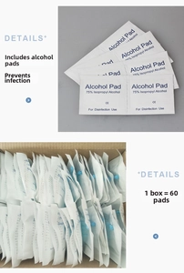 Detail view of 75 percent isopropyl alcohol pads and disposable ear piercing gun supplies