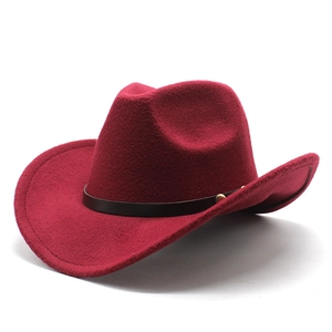 Classic burgundy felt western cowboy hat with brown leather band and gold metal rivets