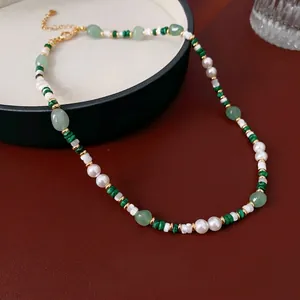 Malachite shell and pearl necklace with golden beads for an elegant vintage jewelry style