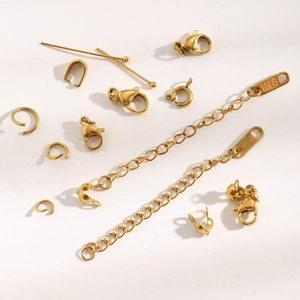 Detail of 18K gold-plated stainless steel lobster clasps and extension chains findings