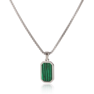 Close-up of a silver stainless steel necklace with a green malachite square pendant