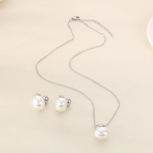 Elegant stainless steel necklace and stud earrings set with white oval shell pendants