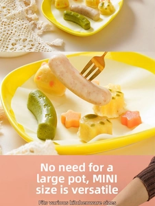 Close-up of mini cat-shaped sausage and star cake silicone mold for baby food DIY