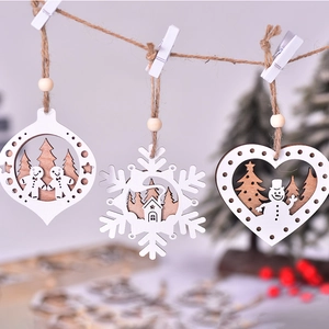 Three-piece laser-cut wooden Christmas ornaments with snowflake and snowman designs