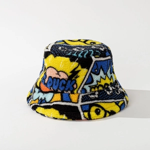 Detail of plush bucket hat with vibrant comic duck pattern and thick fleece texture