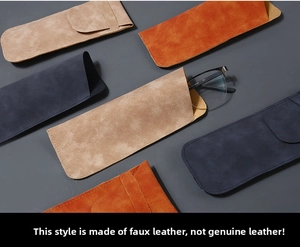 Verschiedene Brillenetuis aus weichem Kunstleder in Blau, Orange und Khaki im Flachlayout
