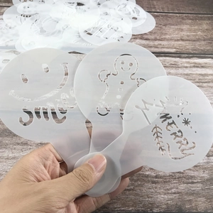 Set of 20 Christmas coffee stencils with smile, gingerbread man, and Merry designs