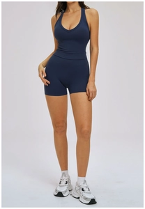 Detail of navy blue yoga set with halter tank top and high waist shorts for fitness