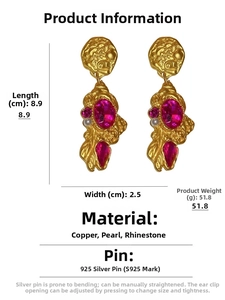 Detailed view of vintage gold flower earrings with pink rhinestones and white pearls