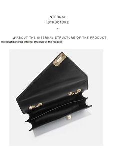 Detail view of the black leather shoulder bag with multi-layer internal structure and gold chain
