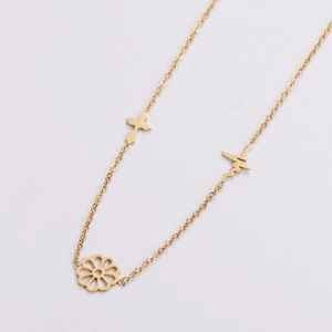 Polished gold stainless steel necklace featuring flower, cross, and heartbeat pendants