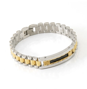 Detail of two-tone stainless steel link bracelet with black carbon fiber inlay and gold finish