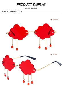 Front and side views of gold-red cloud-shaped rimless sunglasses with metal frame