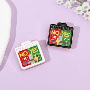 Detailed view of sliding metal enamel pins showing My Attitude scale and battery slider