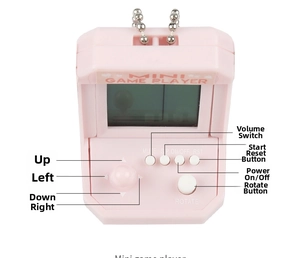 Macro detail of pink mini arcade keychain showing screen, joystick and control buttons