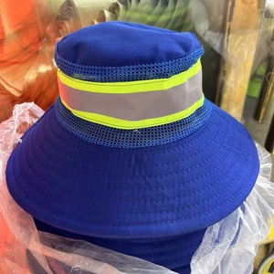 Detail of navy sun hat featuring high-visibility reflective tape and breathable mesh