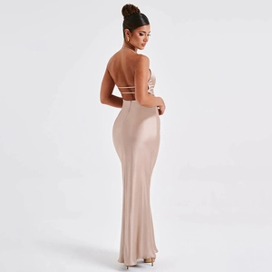 Detailed back view of a champagne satin evening gown featuring an open back and thin straps