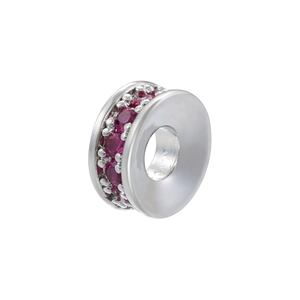 Macro view of silver-plated copper spacer bead with red zircon pavé setting