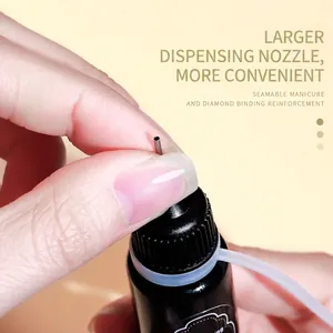 Nail art glue for rhinestones with a precision needle tip applicator for easy DIY manicures