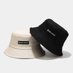 Classic black and beige cotton bucket hats with THE FOCUS embroidery for casual outdoor wear