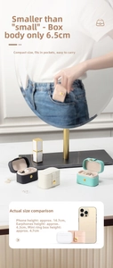 Mini travel jewelry box showing portable size 6.5cm with metal snap and PU leather texture