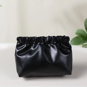 Portable black PU leather small cosmetic storage pouch with squeeze top spring closure