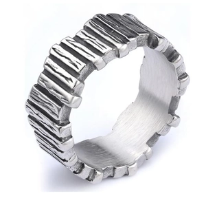 Close-up of industrial textured metal ring showing the brushed inner surface detail