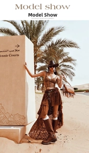 Western retro style outfit featuring a brown studded belt and bohemian desert fashion