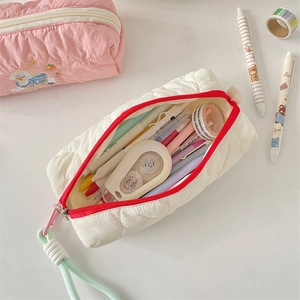 White quilted pencil case with red zipper, large capacity for school stationery storage
