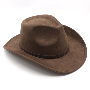 Detailed view of brown faux suede western cowboy hat with slim leather band decoration