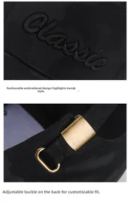 Detail view of the black baseball cap featuring 3D Classic embroidery and metal buckle