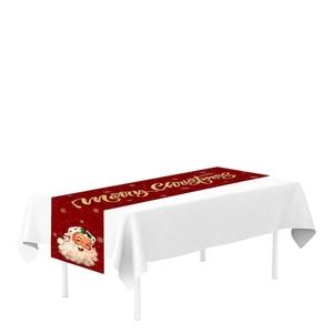 Red Christmas table runner with vintage Santa Claus heads and golden Merry Christmas text