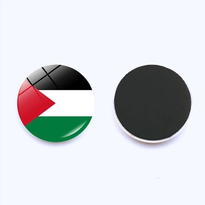 Macro view of crystal glass Palestine flag magnet with black magnetic backing