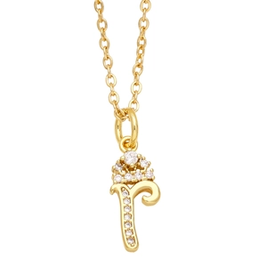Close-up of a gold necklace featuring a letter r pendant set with sparkling white crystals