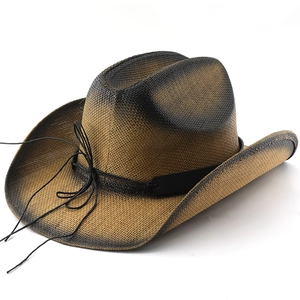 Gros plan détaillé de la texture paille d'un chapeau de cowboy avec finition dégradée