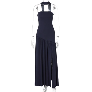 Detail of navy blue halter neck dress with side slit and elegant draped fabric