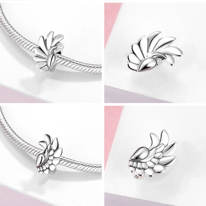 Detailed view of S925 sterling silver insect wing charm spacer with zircon for DIY bracelet