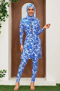 Detail of long-sleeve floral burkini with front zipper and matching swim pants
