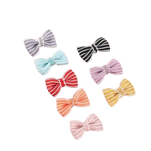 Set of 7 colorful striped ribbon bowknots for DIY crafts and doll accessories