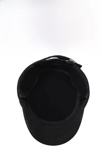 Detail view showing warm plush lining and foldable earflaps of a winter flat cap