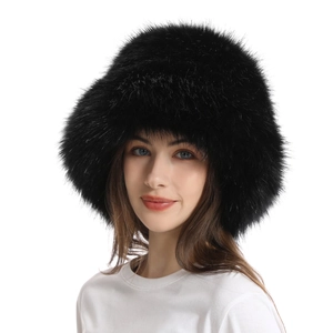 Detailed texture of a black thick faux fur bucket hat for winter warmth and comfort