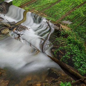 Detail showing high-definition digital print on durable forest waterfall tapestry fabric