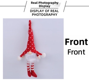 Vue avant du gnome de Noël en peluche avec chapeau rouge à pois et longues jambes
