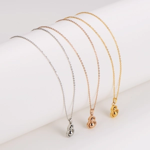 Three elegant stainless steel gourd pendant necklaces in silver, rose gold, and gold plating