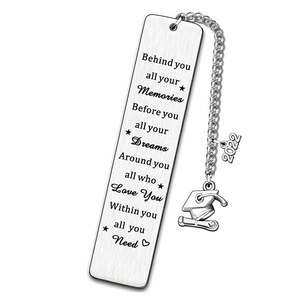 Macro detail of silver bookmark with doctoral cap pendant and 2022 engraved graduation charms
