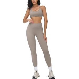 Taupe brushed yoga set featuring halter sports bra and high waisted tummy control leggings